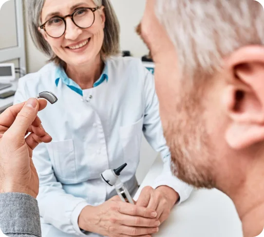 HSP Changes in 2027: 5 Steps Perth Pensioners Should Take Now to Protect Their Hearing Aid Funding Audiologist checking a hearing aid during a hearing services appointment